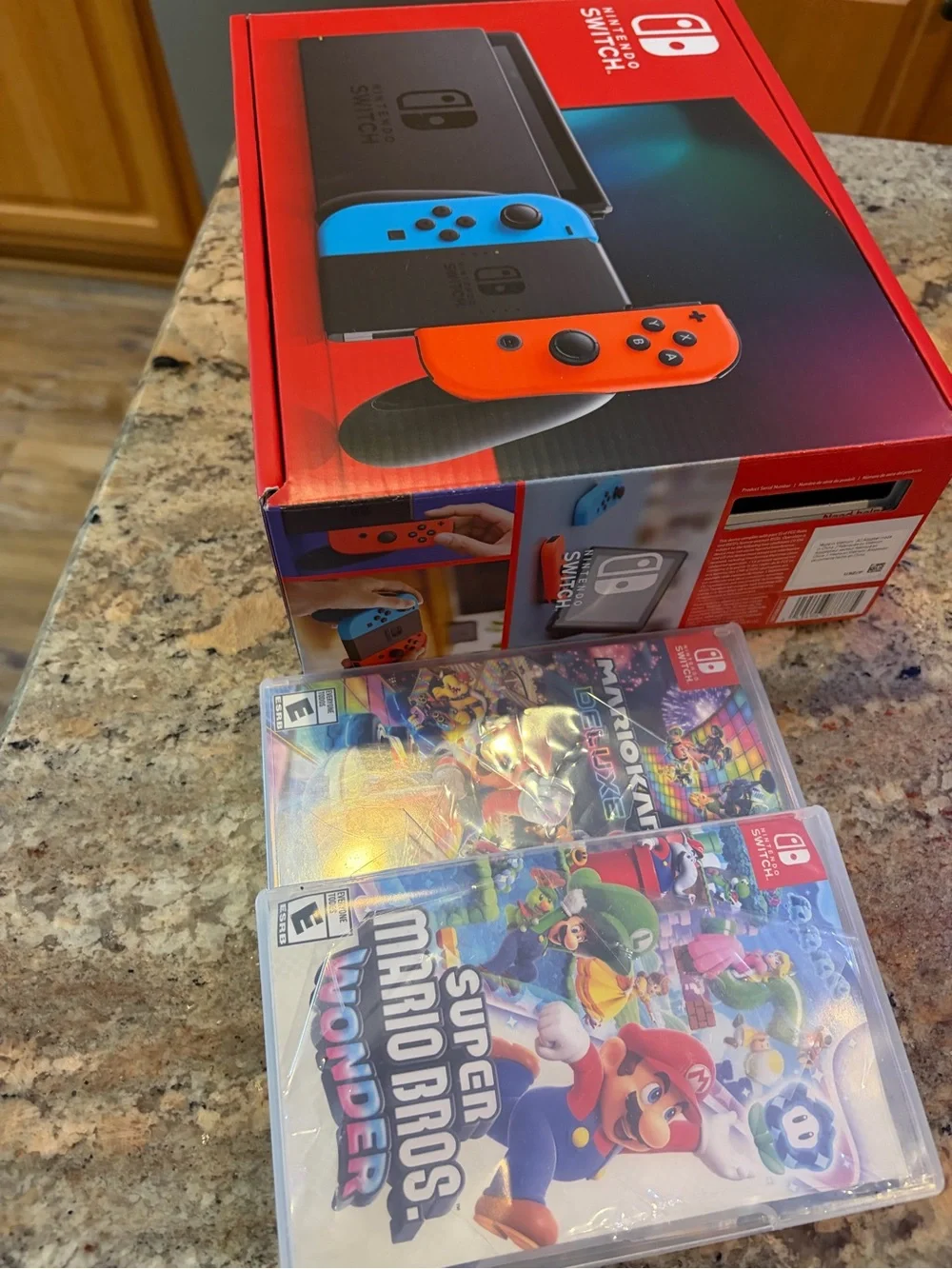 Nintendo Switch with Neon Blue Left and Neon Red Right Joy-Con